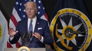 President Joe Biden speaks during a visit to the Office of the Director of National Intelligence